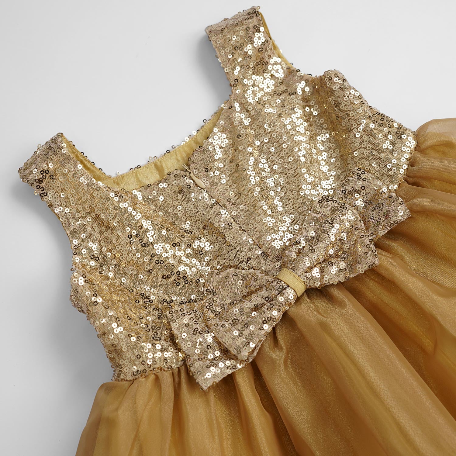 Girls Dull Golden Sequin Organza Frock With Bow